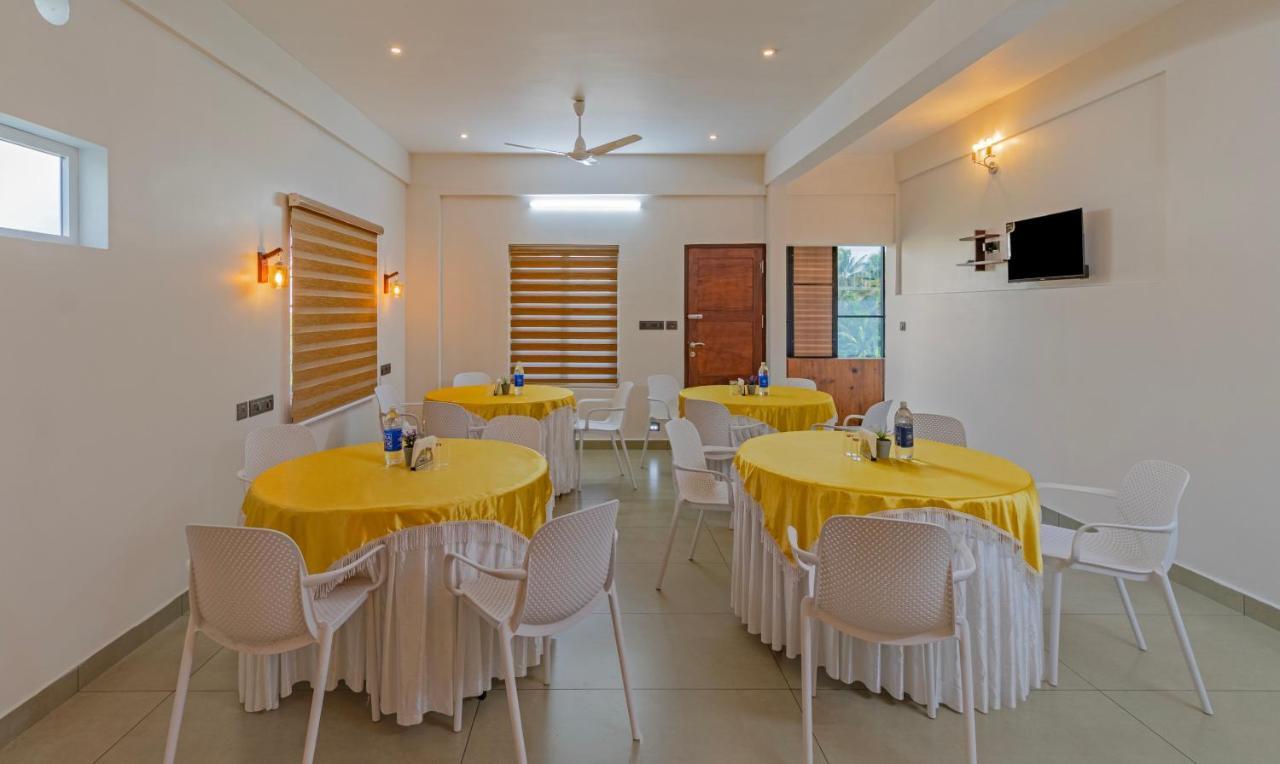 Treebo Amigos Residency Cochin Airport Hotel Kochi ภายนอก รูปภาพ