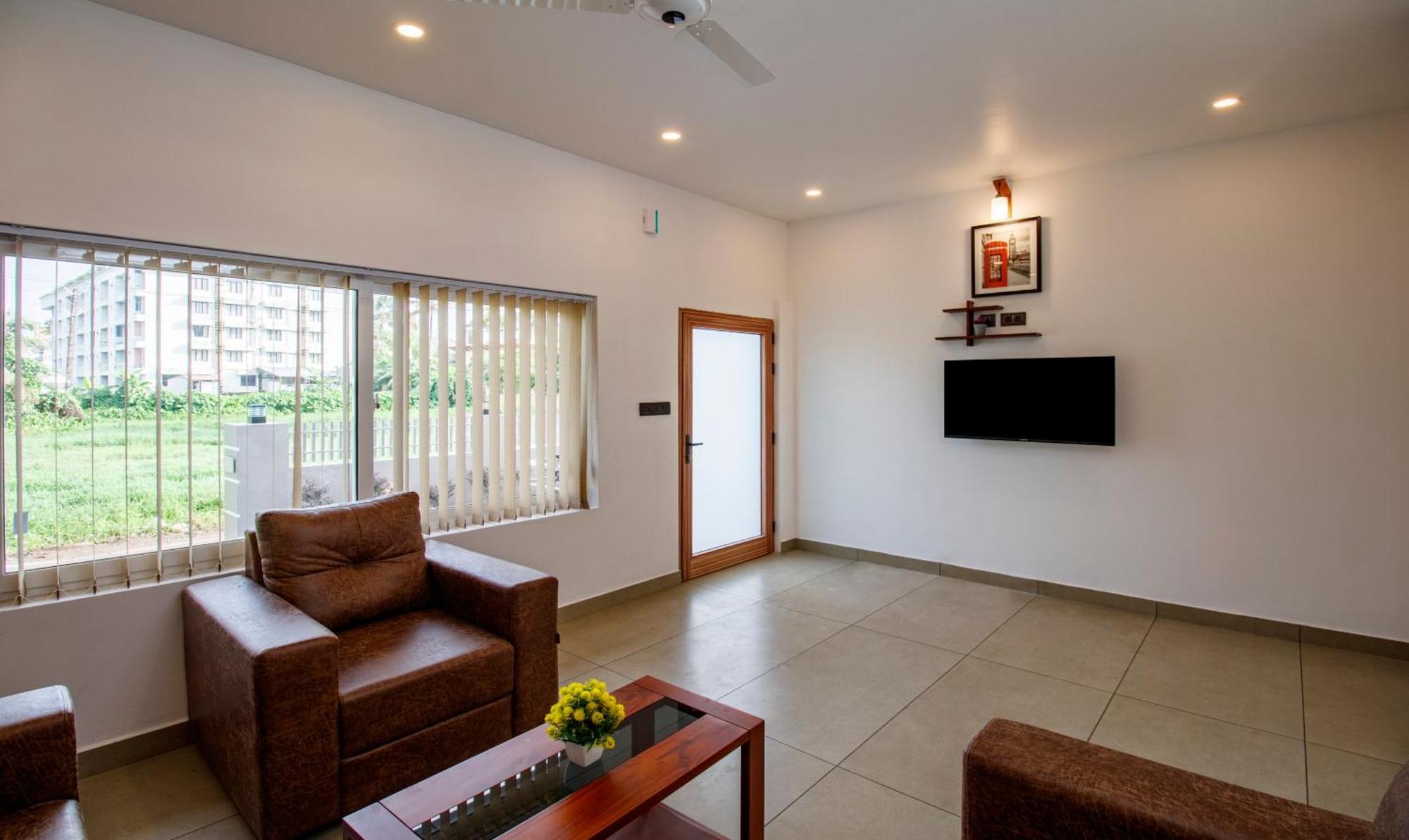 Treebo Amigos Residency Cochin Airport Hotel Kochi ภายนอก รูปภาพ